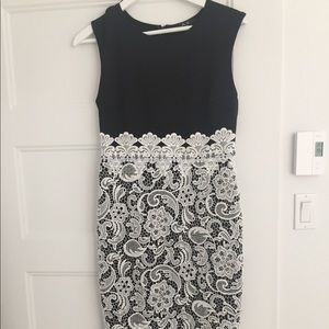 Black dress with lace skirt.